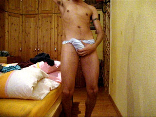Latino Boy changing underwear