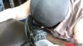 Slave licks shoes clean